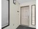 Beige door, neutral-colored walls, small window on each side at 4619 S Ocean Blvd. # 207, North Myrtle Beach, SC 29582