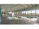 Indoor heated pool and hot tub area with ocean views at 4619 S Ocean Blvd. # 207, North Myrtle Beach, SC 29582
