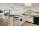 Kitchen with washer, dryer, and ocean view at 4619 S Ocean Blvd. # 207, North Myrtle Beach, SC 29582