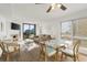Bright living room with ocean views, comfy seating, and dining area at 4619 S Ocean Blvd. # 207, North Myrtle Beach, SC 29582