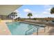 Inviting outdoor pool with steps and surrounding lounge chairs at 4619 S Ocean Blvd. # 207, North Myrtle Beach, SC 29582