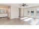 Main bedroom with hardwood floors, double vanity, and private balcony at 4650 Lightkeepers Way # 21D, Little River, SC 29566