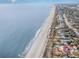 Aerial of beachfront homes and ocean, showing coastal landscape at 501 44Th Ave. N # D-3, Myrtle Beach, SC 29577