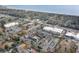 Aerial view of coastal community near beach, featuring townhomes and businesses at 501 44Th Ave. N # D-3, Myrtle Beach, SC 29577