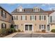 Tan colored two-story building with multiple units and parking at 501 44Th Ave. N # D-3, Myrtle Beach, SC 29577