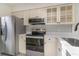 Modern kitchen with stainless steel appliances and white cabinets at 501 44Th Ave. N # D-3, Myrtle Beach, SC 29577