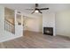 Living room with hardwood floors, fireplace and ceiling fan at 501 44Th Ave. N # D-3, Myrtle Beach, SC 29577