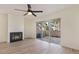 Bright living room with fireplace and sliding glass doors leading to a patio at 501 44Th Ave. N # D-3, Myrtle Beach, SC 29577