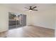 Light-filled living room featuring sliding glass doors and wood-look floors at 501 44Th Ave. N # D-3, Myrtle Beach, SC 29577