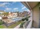 Community pool with surrounding townhouses and lush greenery at 501 44Th Ave. N # D-3, Myrtle Beach, SC 29577