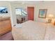 Relaxing bedroom features a sliding door to balcony, a TV, and one bed at 507 S Ocean Blvd. # 201, North Myrtle Beach, SC 29582