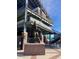 Modern stadium showcasing a bronze mascot statue, brick entrance, and open metal staircases creating a dynamic architectural view at 556 Honeyhill Loop, Conway, SC 29526