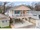 Elevated view of beach house with two stories, deck, and parking underneath at 6001 - 1563 S Kings Hwy., Myrtle Beach, SC 29575