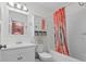 Clean bathroom with white vanity, bathtub, and shower at 6001 - 1563 S Kings Hwy., Myrtle Beach, SC 29575