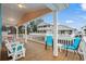 Relaxing deck with picnic table, chairs, and ocean views at 6001 - 1563 S Kings Hwy., Myrtle Beach, SC 29575