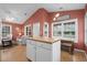 Galley style kitchen with an island and views to living area at 6001 - 1563 S Kings Hwy., Myrtle Beach, SC 29575