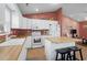 Open kitchen with an island and adjacent living space at 6001 - 1563 S Kings Hwy., Myrtle Beach, SC 29575