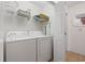 Laundry room with washer, dryer, and shelving at 6001 - 1563 S Kings Hwy., Myrtle Beach, SC 29575