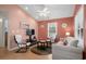 Living room with comfy seating, TV, and calming color palette at 6001 - 1563 S Kings Hwy., Myrtle Beach, SC 29575