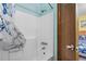 Bright bathroom with a functional shower and seaside decor at 6001 South Kings Hwy., Myrtle Beach, SC 29575