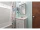 Clean bathroom with single sink vanity and shower-tub combination at 6001 South Kings Hwy., Myrtle Beach, SC 29575