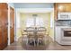 Bright eat-in kitchen with updated appliances and seaside decor at 6001 South Kings Hwy., Myrtle Beach, SC 29575