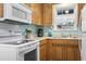 Cozy kitchen with a view, lots of cabinet space and white appliances at 6001 South Kings Hwy., Myrtle Beach, SC 29575