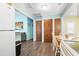 Open living space with view of dining area and hall at 6001 South Kings Hwy., Myrtle Beach, SC 29575