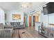 Bright living room with vaulted ceiling, open layout, and beach-themed decor at 6001 South Kings Hwy., Myrtle Beach, SC 29575
