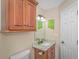 Small bathroom with granite countertop, wood cabinets, and a shower/tub combo at 6001-1909 S Kings Hwy., Myrtle Beach, SC 29575