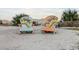 Two whimsical starfish-themed chairs on sandy beach at 6001-1909 S Kings Hwy., Myrtle Beach, SC 29575