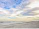 Scenic beach view with calm ocean waves and a partly cloudy sky at 6001-1909 S Kings Hwy., Myrtle Beach, SC 29575