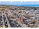 Aerial view of a house near the beach, showcasing the neighborhood and ocean at 6001-5732 S Kings Hwy., Myrtle Beach, SC 29575