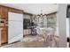 Bright kitchen with white appliances and a dining area at 6001-5732 S Kings Hwy., Myrtle Beach, SC 29575
