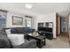 Comfortable living room with sectional sofa and neutral decor at 6001-5732 S Kings Hwy., Myrtle Beach, SC 29575