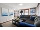 Cozy living room featuring a sectional sofa and adjacent kitchen at 6001-5732 S Kings Hwy., Myrtle Beach, SC 29575
