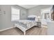 Charming bedroom with white furniture and en-suite bathroom at 601 Hillside Dr. N # 2925, North Myrtle Beach, SC 29582