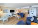 Open-concept living area with ocean views and a dining space at 645 Retreat Beach Circle, Pawleys Island, SC 29585