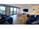 Comfortable living room with ocean views and dining area at 645 Retreat Beach Circle, Pawleys Island, SC 29585
