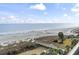 Aerial view showcasing the beach and boardwalk at 6804 N Ocean Blvd. # 617, Myrtle Beach, SC 29572