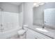 Bathroom boasts granite countertop vanity and tub at 70 Addison Cottage Way # 319, Murrells Inlet, SC 29576