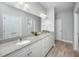 Double vanity bathroom with granite countertops at 70 Addison Cottage Way # 319, Murrells Inlet, SC 29576