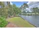 Peaceful waterfront view with lush green space at 70 Addison Cottage Way # 319, Murrells Inlet, SC 29576