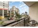 Balcony overlooking the parking lot, neighboring buildings, and a partial view of the ocean at 7100 Ocean Blvd. # 223, Myrtle Beach, SC 29572