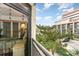 Balcony with view of neighboring building and a peek into the adjacent room at 7100 Ocean Blvd. # 223, Myrtle Beach, SC 29572