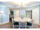 Cozy dining room with seating for four and modern lighting at 7100 Ocean Blvd. # 223, Myrtle Beach, SC 29572