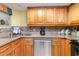 Bright kitchen featuring stainless steel appliances, granite countertops, and decorative backsplash at 7100 Ocean Blvd. # 223, Myrtle Beach, SC 29572