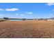 Spacious backyard with a lake view and pergola at 747 Coquina Bay Dr., Conway, SC 29526