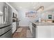Modern kitchen with stainless steel appliances and granite countertops at 747 Coquina Bay Dr., Conway, SC 29526