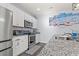 Modern kitchen with stainless steel appliances and granite countertops at 747 Coquina Bay Dr., Conway, SC 29526